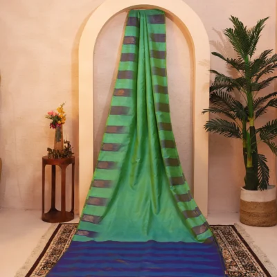 Handloom Silk Green in sunshine with Zari Peacock