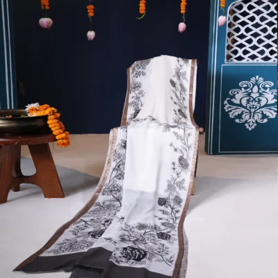 White & Black Floral Crape Silk Saree with Golden Zari Border
